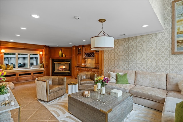 10 Crick Holly Ln, East Islip, NY 11730 - living area with wallpapered walls, recessed lighting, a glass covered fireplace, and light tile patterned floors