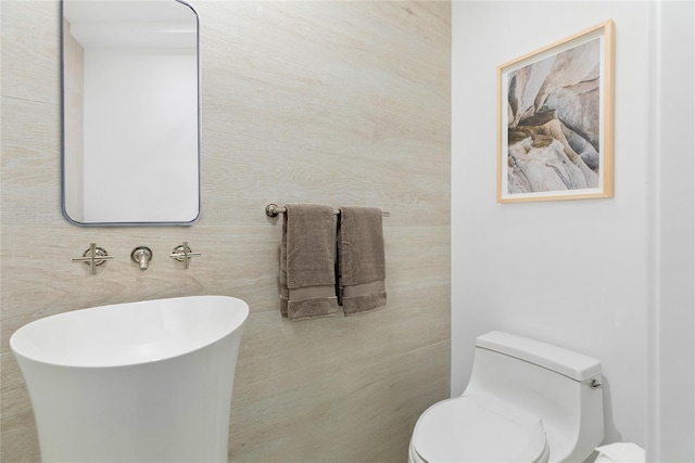 bathroom featuring toilet