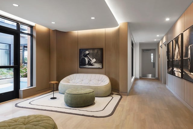 corridor featuring recessed lighting and wood finished floors
