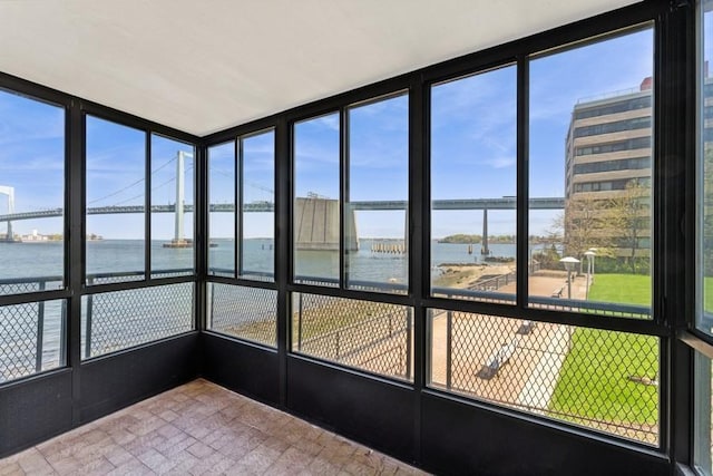 166-25 Powells Cove Blvd Unit 1A, Whitestone, NY 11357 - unfurnished sunroom with a water view