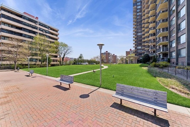 166-25 Powells Cove Blvd Unit 1A, Whitestone, NY 11357 - view of community with fence and a yard