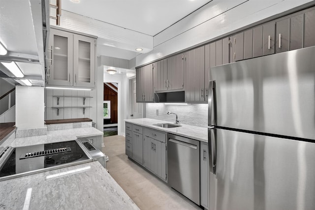 285 Grand St, Croton-On-Hudson, NY 10520 - kitchen with stainless steel appliances, gray cabinets, tasteful backsplash, and light stone counters