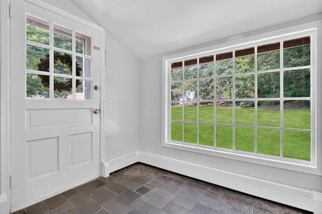 285 Grand St, Croton-On-Hudson, NY 10520 - entryway featuring vaulted ceiling, dark stone finish floors, and baseboard heating