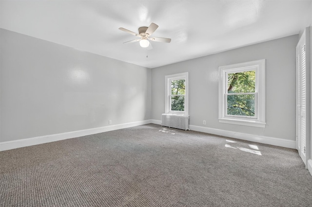 285 Grand St, Croton-On-Hudson, NY 10520 - carpeted spare room featuring radiator and ceiling fan