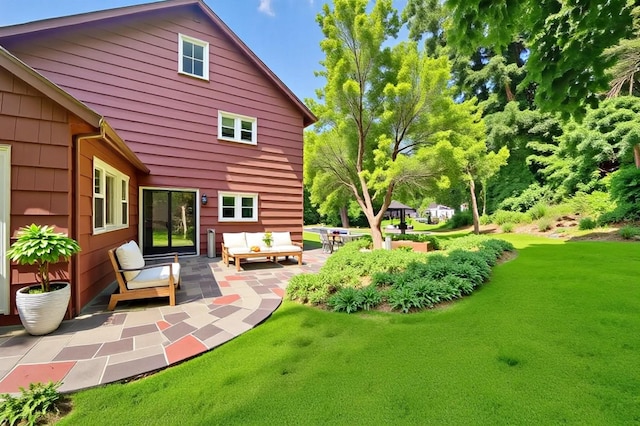 285 Grand St, Croton-On-Hudson, NY 10520 - rear view of property featuring a patio area, an outdoor hangout area, and a lawn