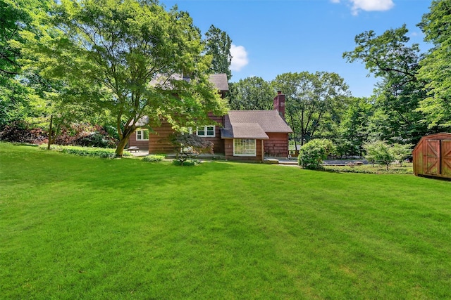 285 Grand St, Croton-On-Hudson, NY 10520 - view of grassy yard with a storage shed