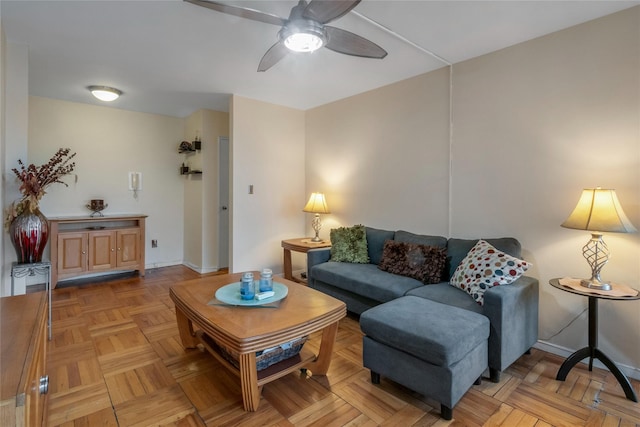 3131 Grand Concourse Unit 11J, Bronx, NY 10468 - living room with baseboards and ceiling fan