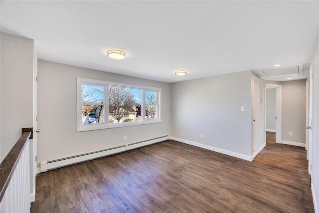 7 Howard Ave, Freeport, NY 11520 - spare room with baseboard heating, recessed lighting, baseboards, and wood finished floors