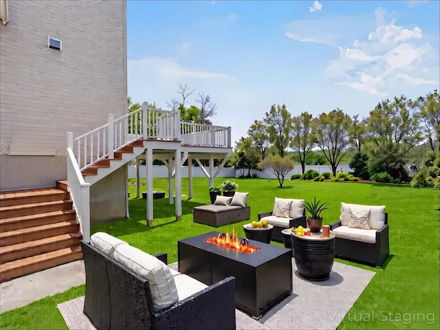 view of patio featuring an outdoor living space with a fire pit, stairs, and a wooden deck