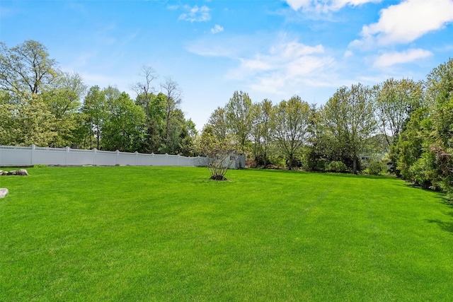 view of yard featuring fence