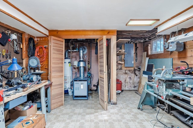 unfinished basement featuring gas water heater, electric panel, and a workshop area
