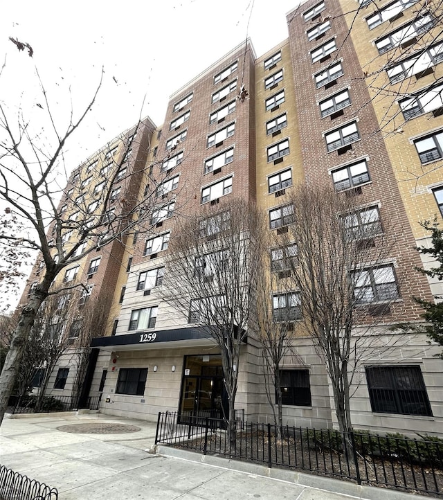 1259 Grant Ave Unit 8A, Bronx, NY 10456 - view of building exterior featuring fence