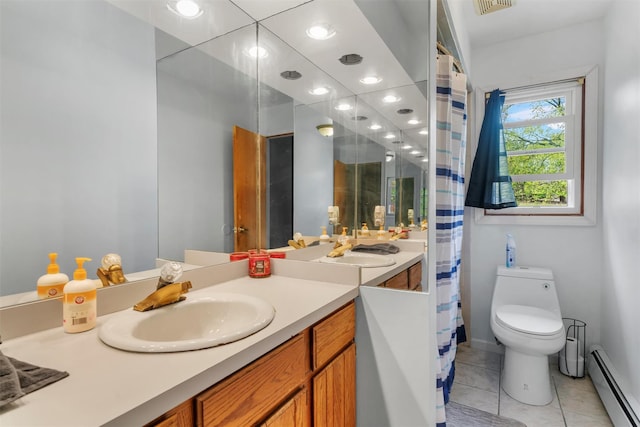 bathroom with baseboard heating, tile patterned floors, vanity, toilet, and recessed lighting