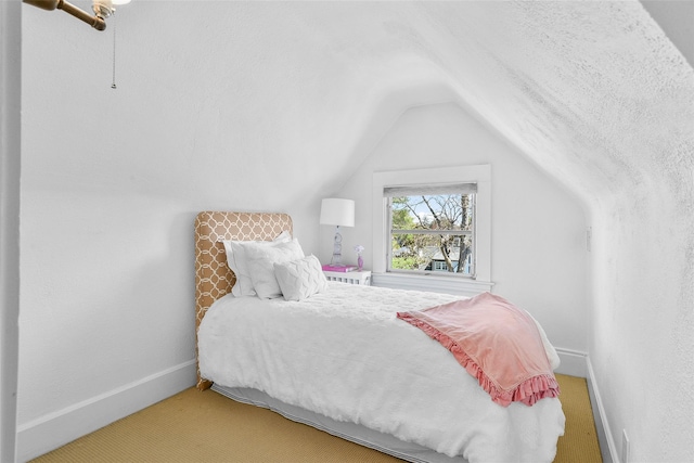 33 Fernwood Rd, Larchmont, NY 10538 - carpeted bedroom with vaulted ceiling and baseboards