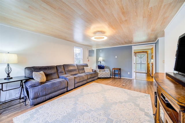 living area with wood finished floors and wooden ceiling