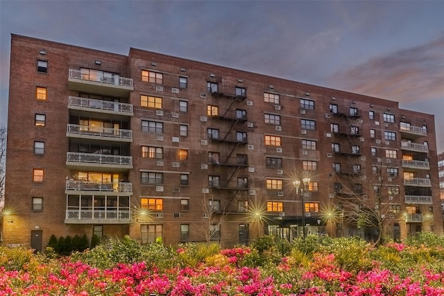 view of property at dusk