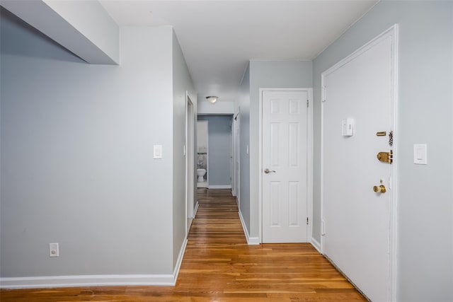88-25 155th Ave Unit 6L, Howard Beach, NY 11414 - hall with light wood-style flooring and baseboards