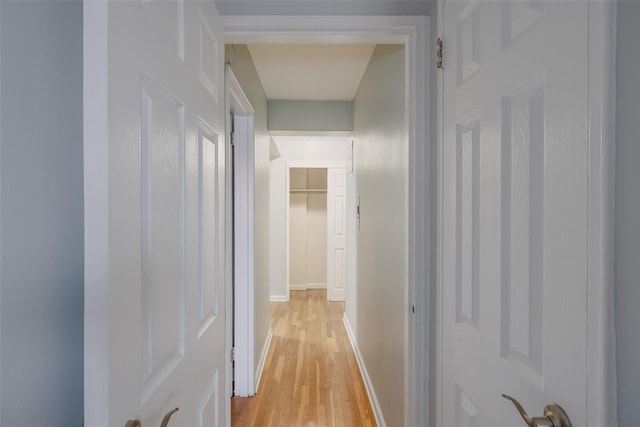 88-25 155th Ave Unit 6L, Howard Beach, NY 11414 - hallway with baseboards and light wood-style floors