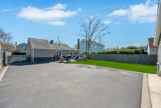 exterior space featuring a fenced backyard
