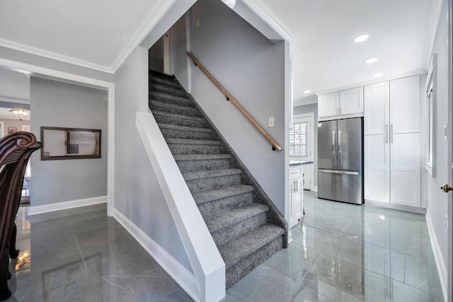 staircase with baseboards, ornamental molding, recessed lighting, and marble finish floor