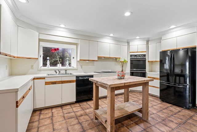 145 Asharoken Ave, Northport, NY 11768 - kitchen featuring a sink, white cabinetry, light countertops, and black appliances