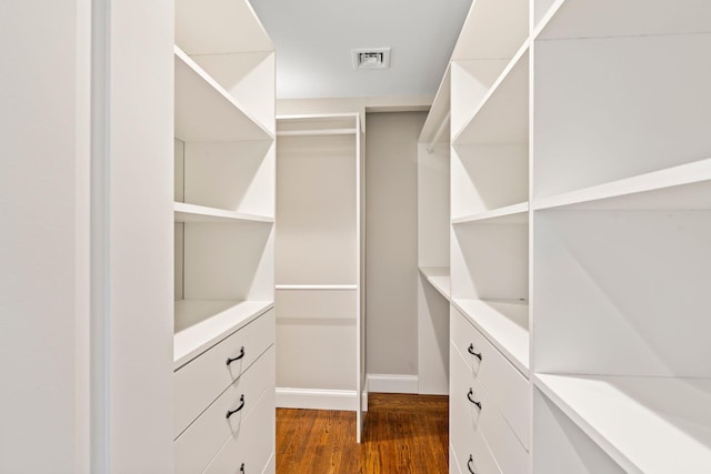 145 Asharoken Ave, Northport, NY 11768 - spacious closet with dark wood-style floors and visible vents