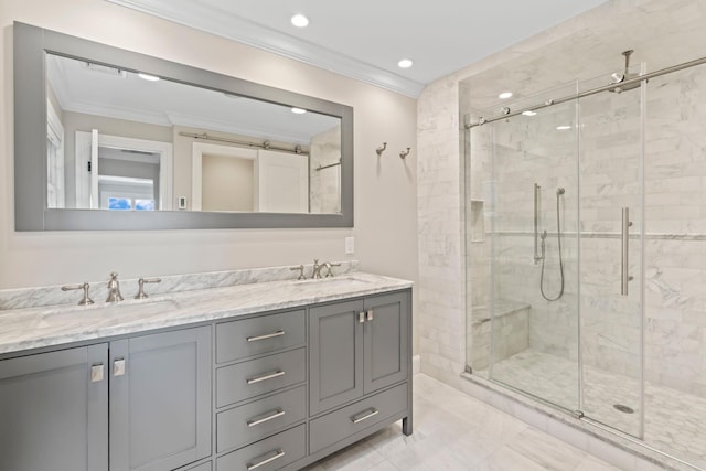 145 Asharoken Ave, Northport, NY 11768 - bathroom with double vanity, a sink, a stall shower, and crown molding