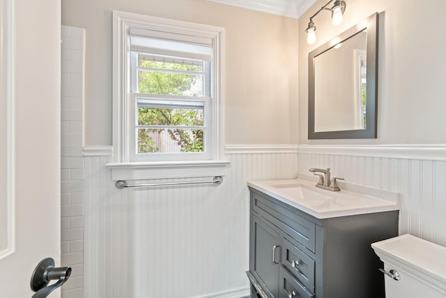 145 Asharoken Ave, Northport, NY 11768 - bathroom featuring wainscoting, toilet, and vanity