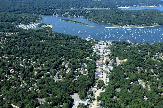 145 Asharoken Ave, Northport, NY 11768 - birds eye view of property featuring a forest view and a water view