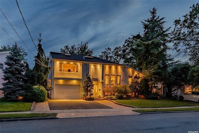2872 Rosebud Ave, Merrick, NY 11566 - view of front of property featuring a garage, concrete driveway, and a front yard