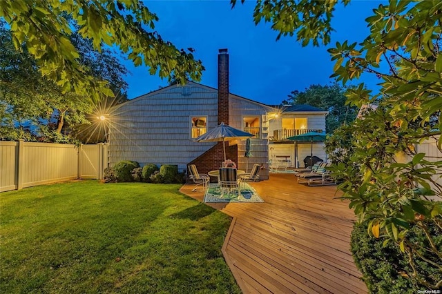 2872 Rosebud Ave, Merrick, NY 11566 - back of house featuring a deck, a lawn, a chimney, and a fenced backyard