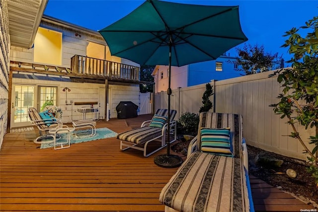 2872 Rosebud Ave, Merrick, NY 11566 - wooden deck featuring grilling area and a fenced backyard