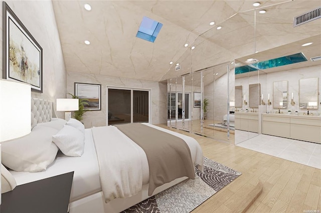 2872 Rosebud Ave, Merrick, NY 11566 - bedroom featuring a skylight, recessed lighting, wood finished floors, and visible vents