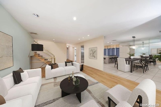 2872 Rosebud Ave, Merrick, NY 11566 - living area featuring recessed lighting, visible vents, wood finished floors, and stairs