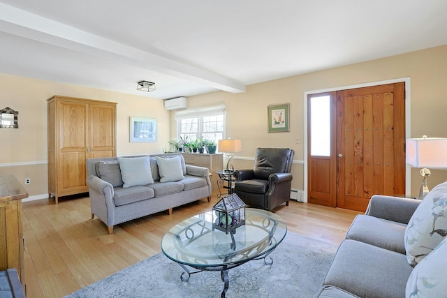 24 Burnsdale Ave, Valhalla, NY 10595 - living room with a baseboard heating unit, a wall mounted air conditioner, light wood-style floors, beam ceiling, and baseboards