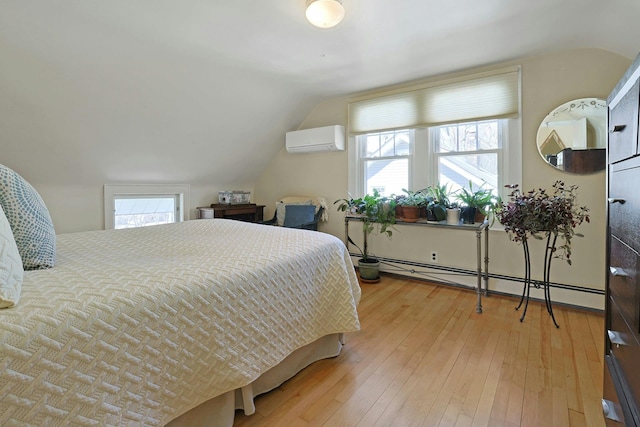 24 Burnsdale Ave, Valhalla, NY 10595 - bedroom featuring a baseboard heating unit, an AC wall unit, lofted ceiling, and wood-type flooring