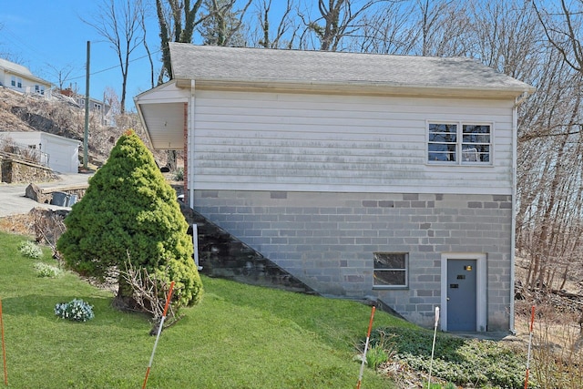 24 Burnsdale Ave, Valhalla, NY 10595 - view of property exterior with a lawn and a shingled roof