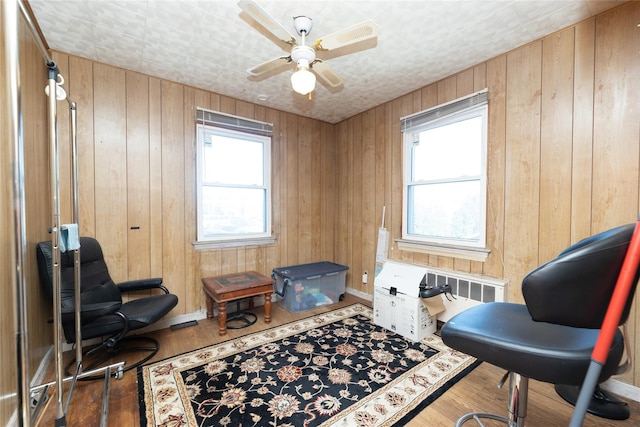 3476 Bruner Ave, Bronx, NY 10469 - living area with wooden walls and plenty of natural light