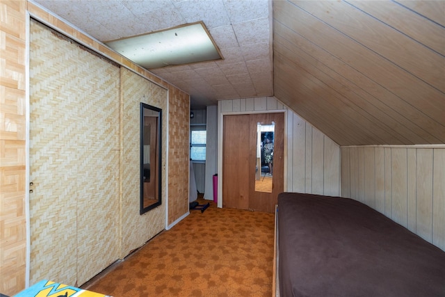 3476 Bruner Ave, Bronx, NY 10469 - bonus room with carpet flooring, wood walls, and vaulted ceiling