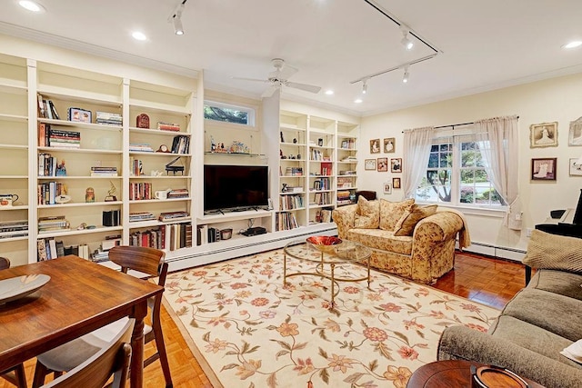 28 Rose Ave, Great Neck, NY 11021 - living room with rail lighting, a baseboard radiator, ceiling fan, ornamental molding, and recessed lighting
