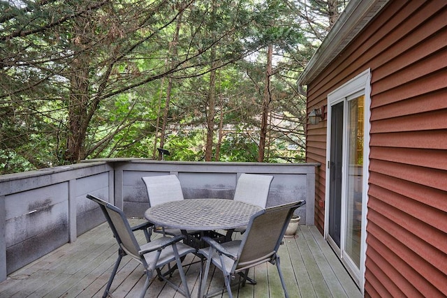 28 Rose Ave, Great Neck, NY 11021 - wooden terrace with outdoor dining space