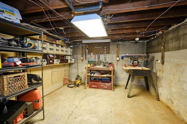 28 Rose Ave, Great Neck, NY 11021 - unfinished below grade area featuring a workshop area