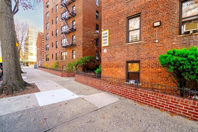 view of property featuring fence