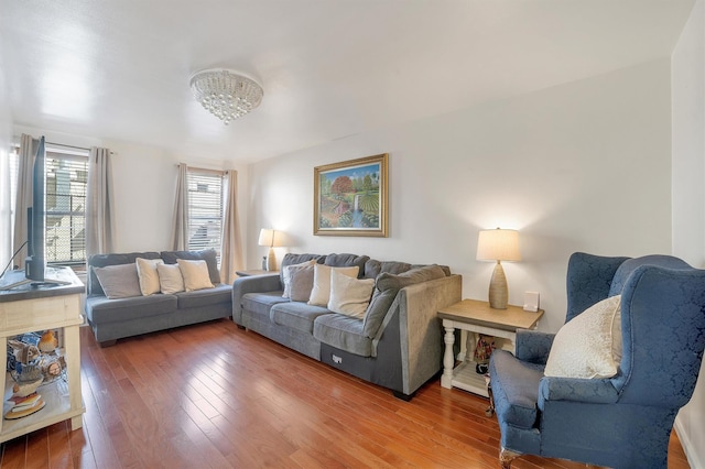 2750 Olinville Ave Unit 1K, Bronx, NY 10467 - living room featuring a chandelier and hardwood / wood-style flooring