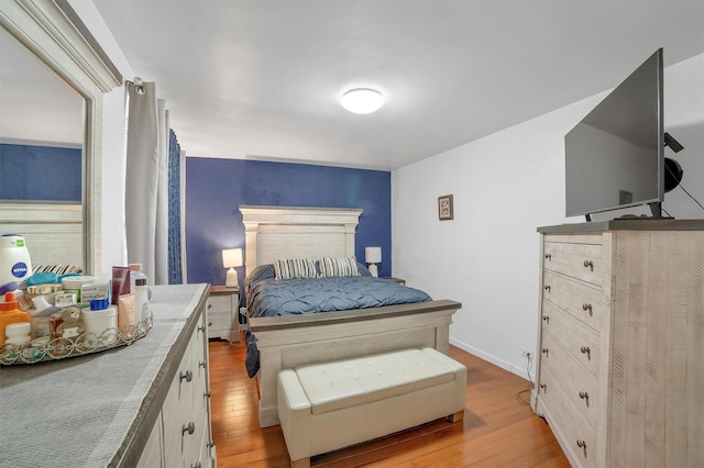 2750 Olinville Ave Unit 1K, Bronx, NY 10467 - bedroom with baseboards and wood finished floors