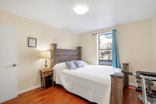 2750 Olinville Ave Unit 1K, Bronx, NY 10467 - bedroom with baseboards and wood finished floors