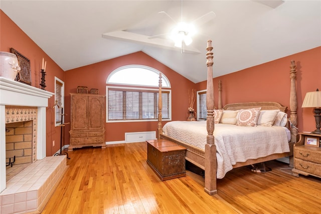355 Divot Rd, Oceanside, NY 11572 - bedroom with light wood-type flooring and lofted ceiling