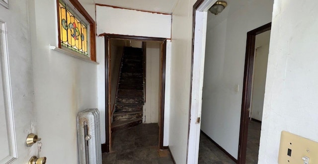 181-10 93rd Ave, Hollis, NY 11423 - hallway featuring stone finish flooring and radiator heating unit