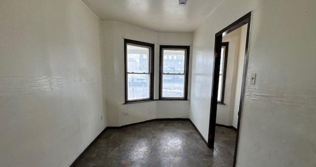 181-10 93rd Ave, Hollis, NY 11423 - unfurnished room featuring baseboards and a healthy amount of sunlight