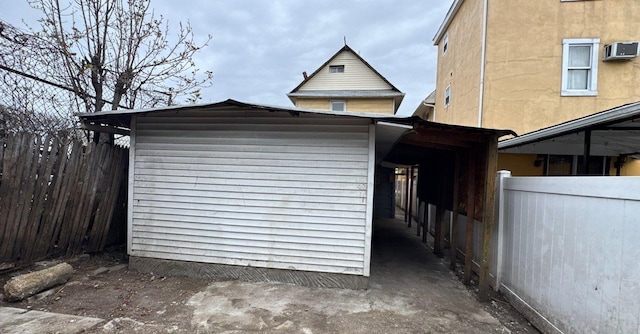 181-10 93rd Ave, Hollis, NY 11423 - exterior space with an outdoor structure and fence